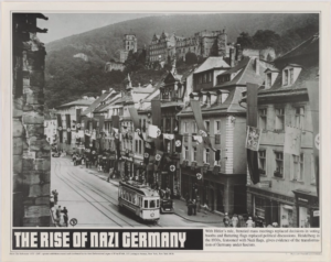Photograph of Heidelberg in 1930 with Nazi flags everywhere depicting the rising fascism in Germany. Part of an exhibition created and distributed in 1977 by the Anti-Defamation League