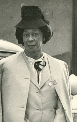 Photograph of Lucy Hicks Anderson with deputy sheriffs c. 1954