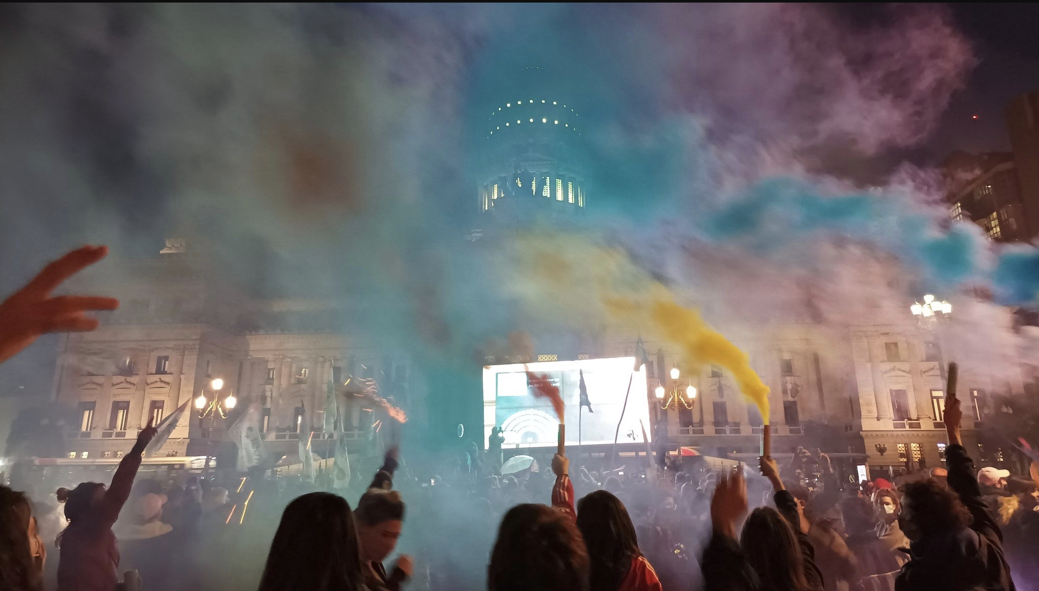 Protesters celebrating after the employment quota law was passed